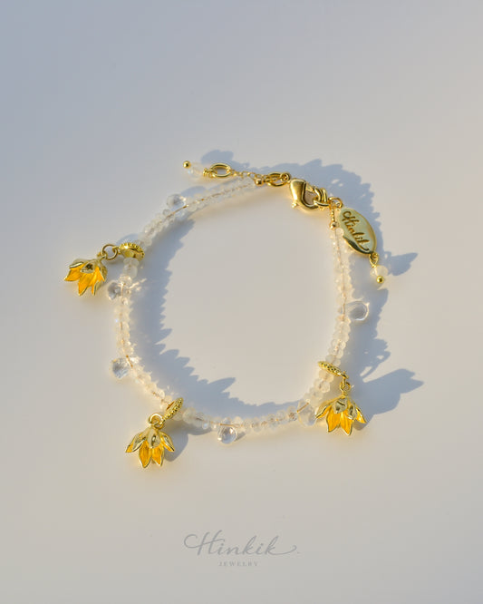 สร้อยข้อมือดอกพิกุล | สร้อยข้อมือหินมูนสโตนและไวท์โทแพซ (ดอกพิกุล)