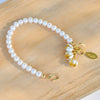 Freshwater Pearl Bracelet with White Enamel Jasmine Flowers