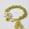 Orange Jasmine Flower Bracelet with Peridot and Pearl Tassels - Handmade by Hinkik Jewelry