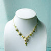 White Enamel Orange Jasmine Flower Necklace with Green Peridot - Handmade by Hinkik Jewelry