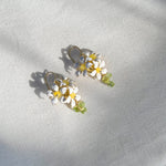 White Enamel Orange Jasmine Flower Earrings with Green Peridot - Handmade by Hinkik Jewelry