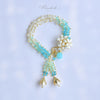 Orange Jasmine Flower Bracelet with Peridot and Pearl Tassels - Handmade by Hinkik Jewelry