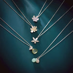 Sterling Silver Necklace with Lemon Chalcedony Drop & Silver Flower