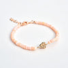 Pink Opal Bracelet with Rose Gold-Plated Crown Flower Charm